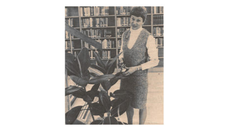 Admiring her new acquisition is library
assistant, Mrs. Jackie McIntyre. Horticulture students have also donated a Benjamin fig, a Norfolk Island pine tree and Boston ferns to the LC. The library is just one of the areas with new greenery. Administration offices, unit offices and the bookroom are also being decorated.