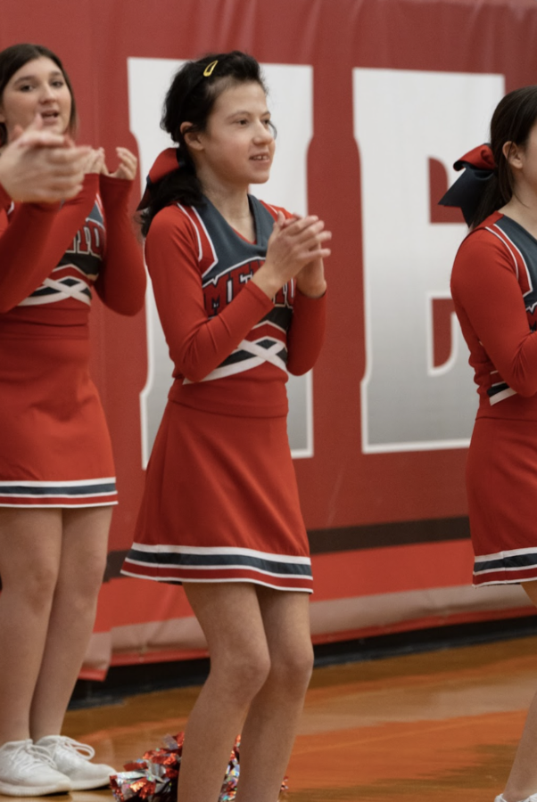 Haley cheering at a home basketball game