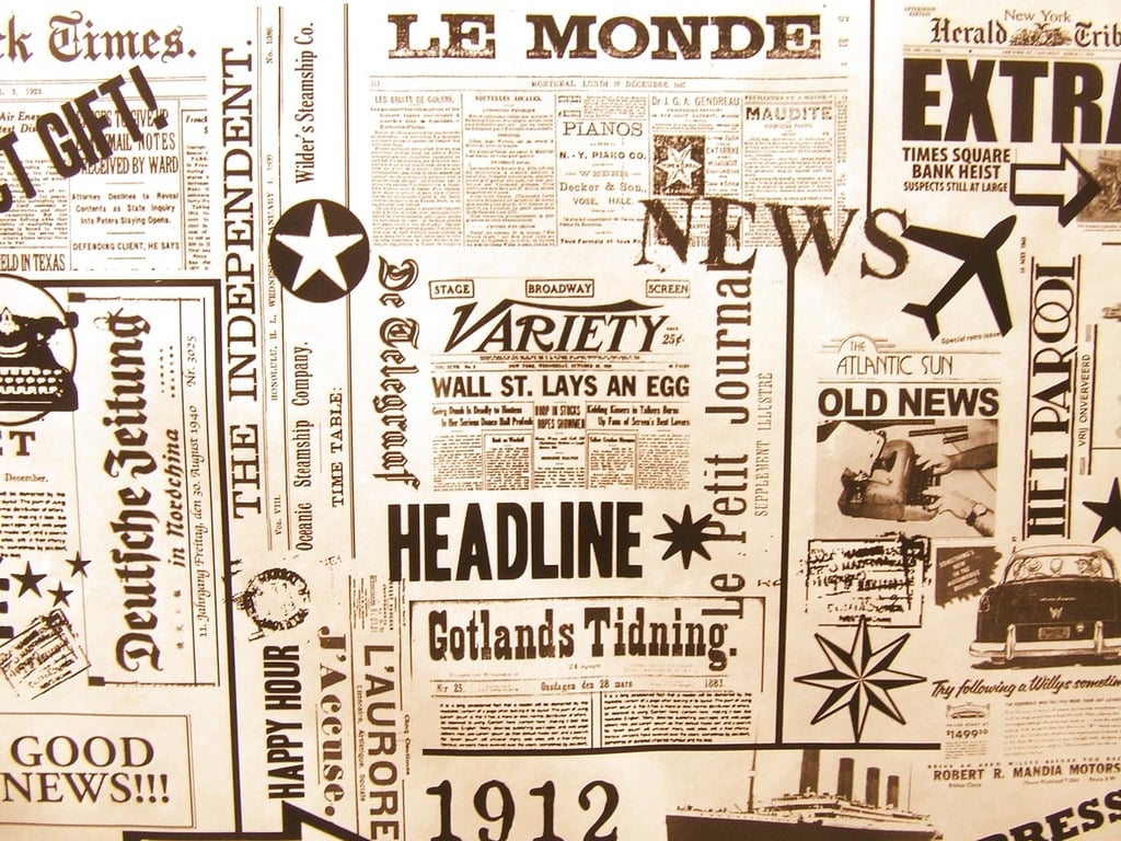 A newspaper page with a bunch of newspaper headlines on it. 