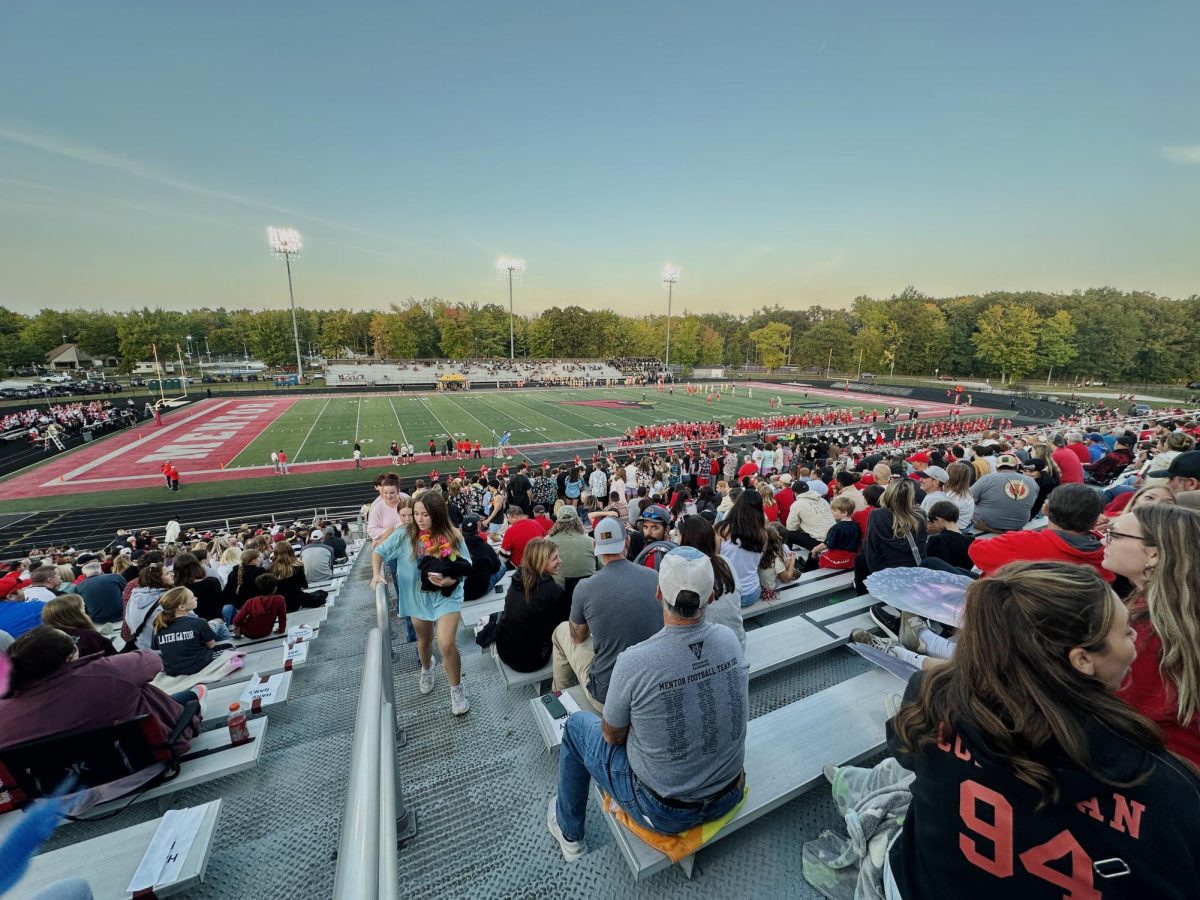 Clear skies during the football game.