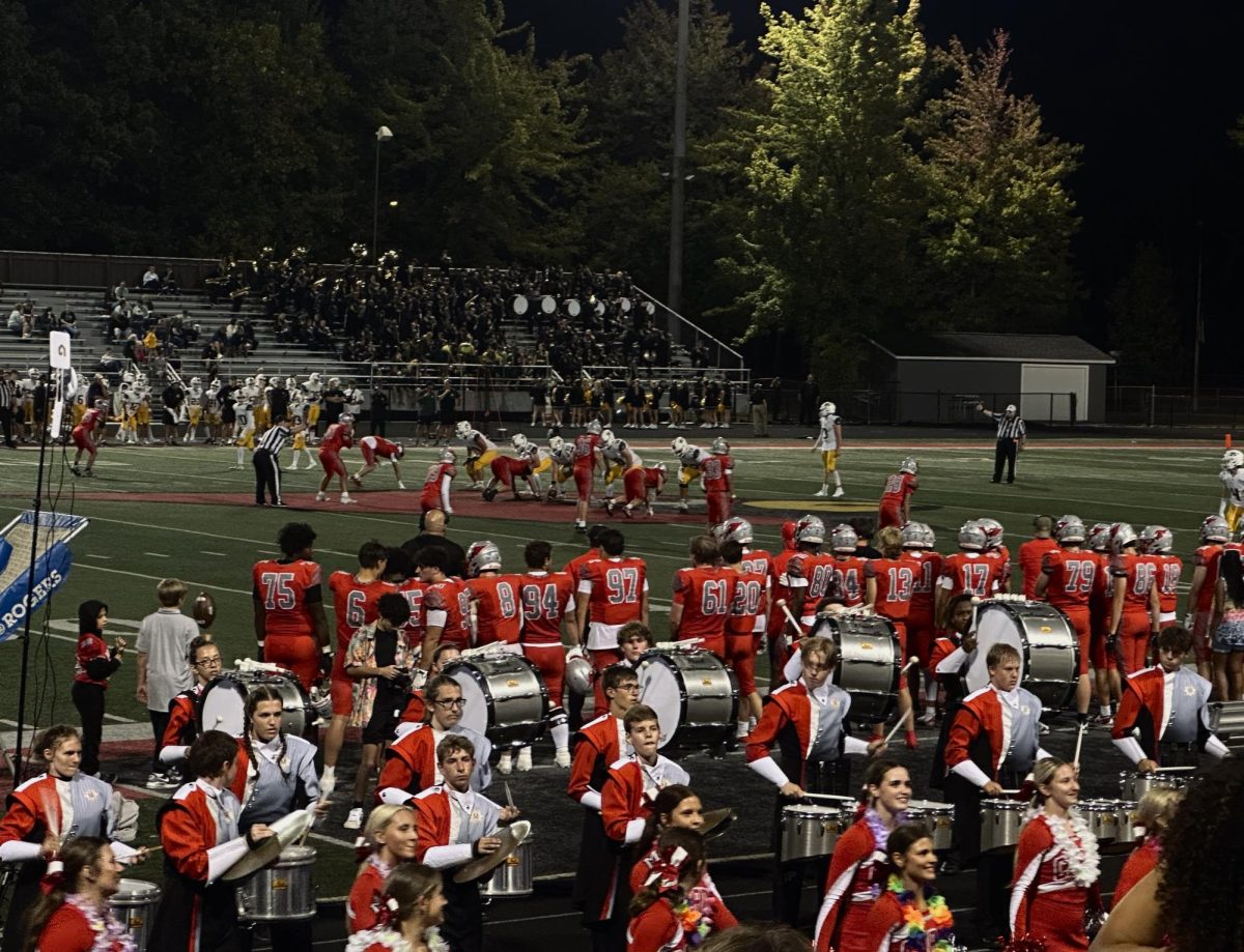 Mentor’s marching band and cheerleaders performing as the game continues.
