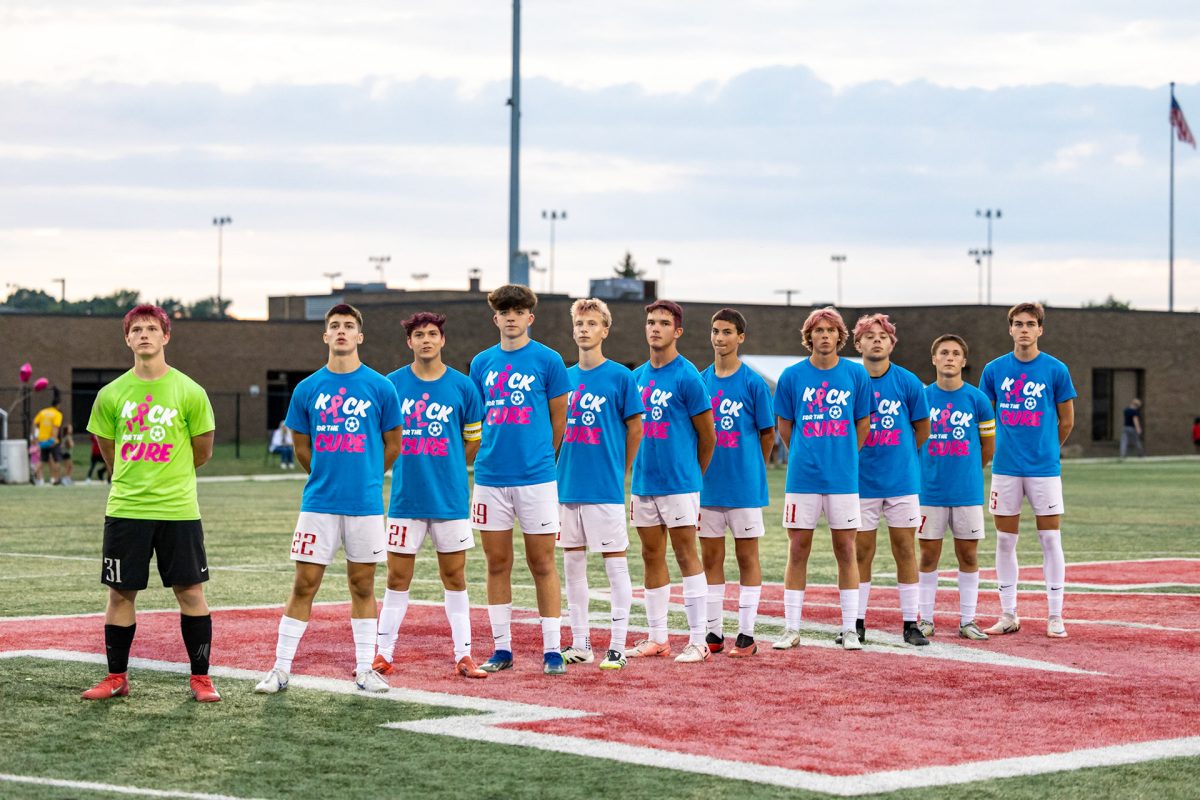 Mentor High School Boy's Soccer team before their Kick for The Cure game