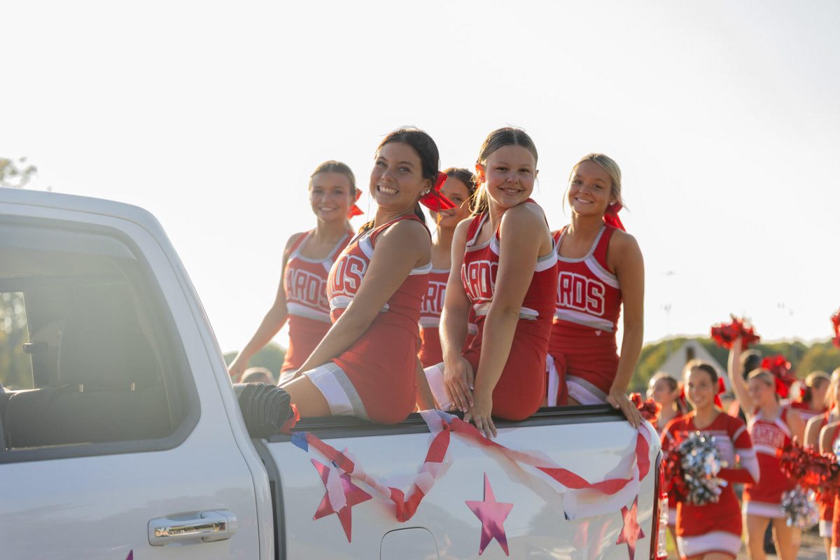 MHS Varsity Cheerleaders at the Homecoming Parade